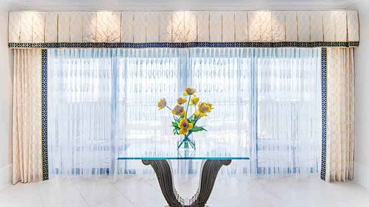 Elegant top treatments for windows showcased by The Fabric Source for stylish home decor.
