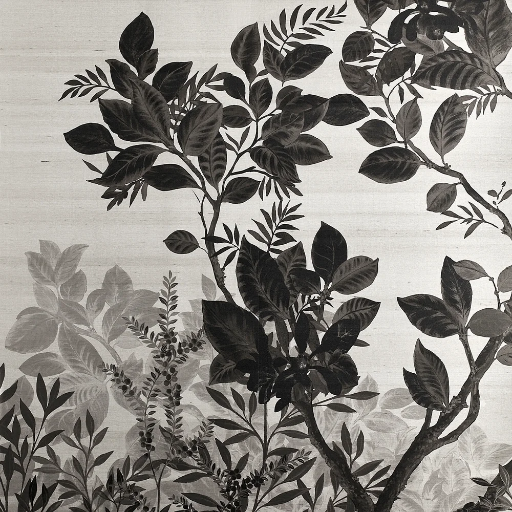 Phillip Jeffries Haven wallcovering with a monochrome botanical tree-and-leaf mural pattern in layered black, gray, and pale tones.